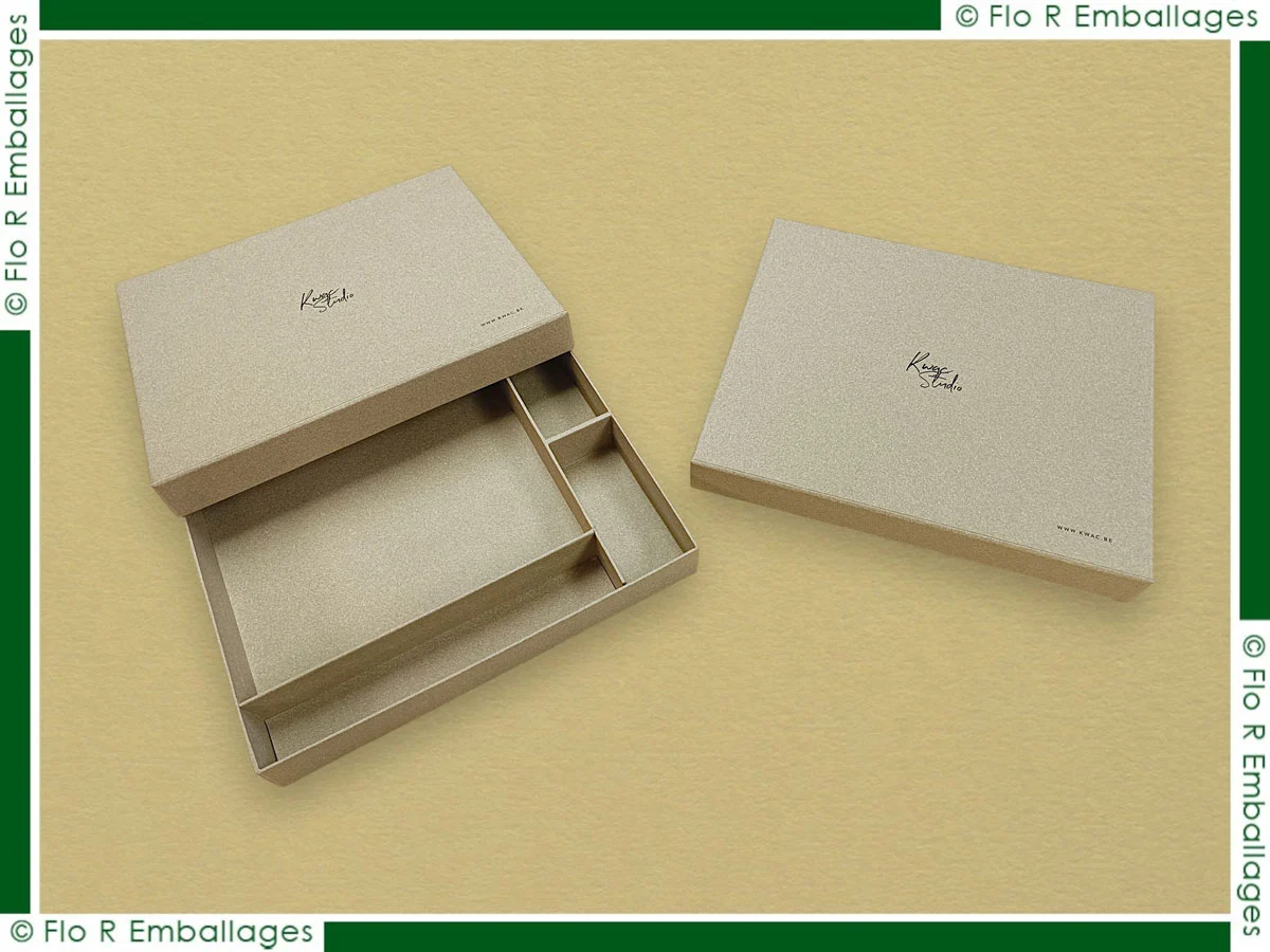 Coffret en carton à deux parties avec compartiments personnalisables, format et disposition réalisés sur-mesure, offrant organisation, protection et présentation soignée