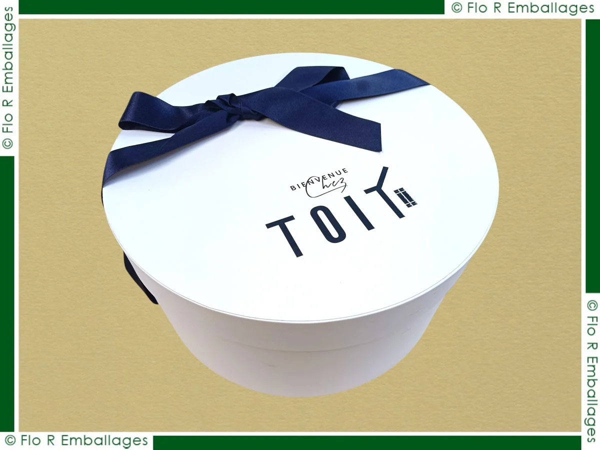Coffret rond imprimé avec ruban et nœud décoratif